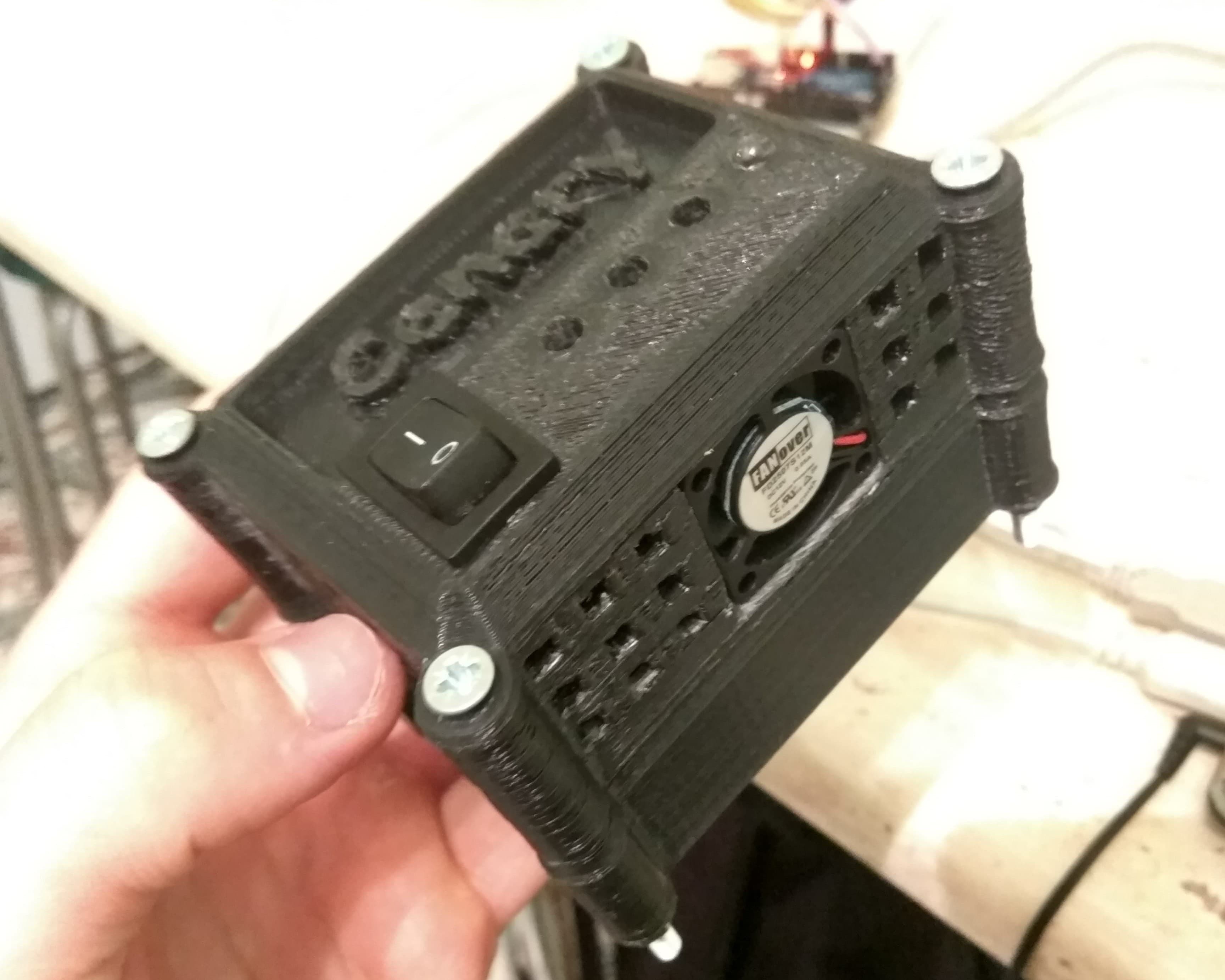 Assembled device with cooling fan