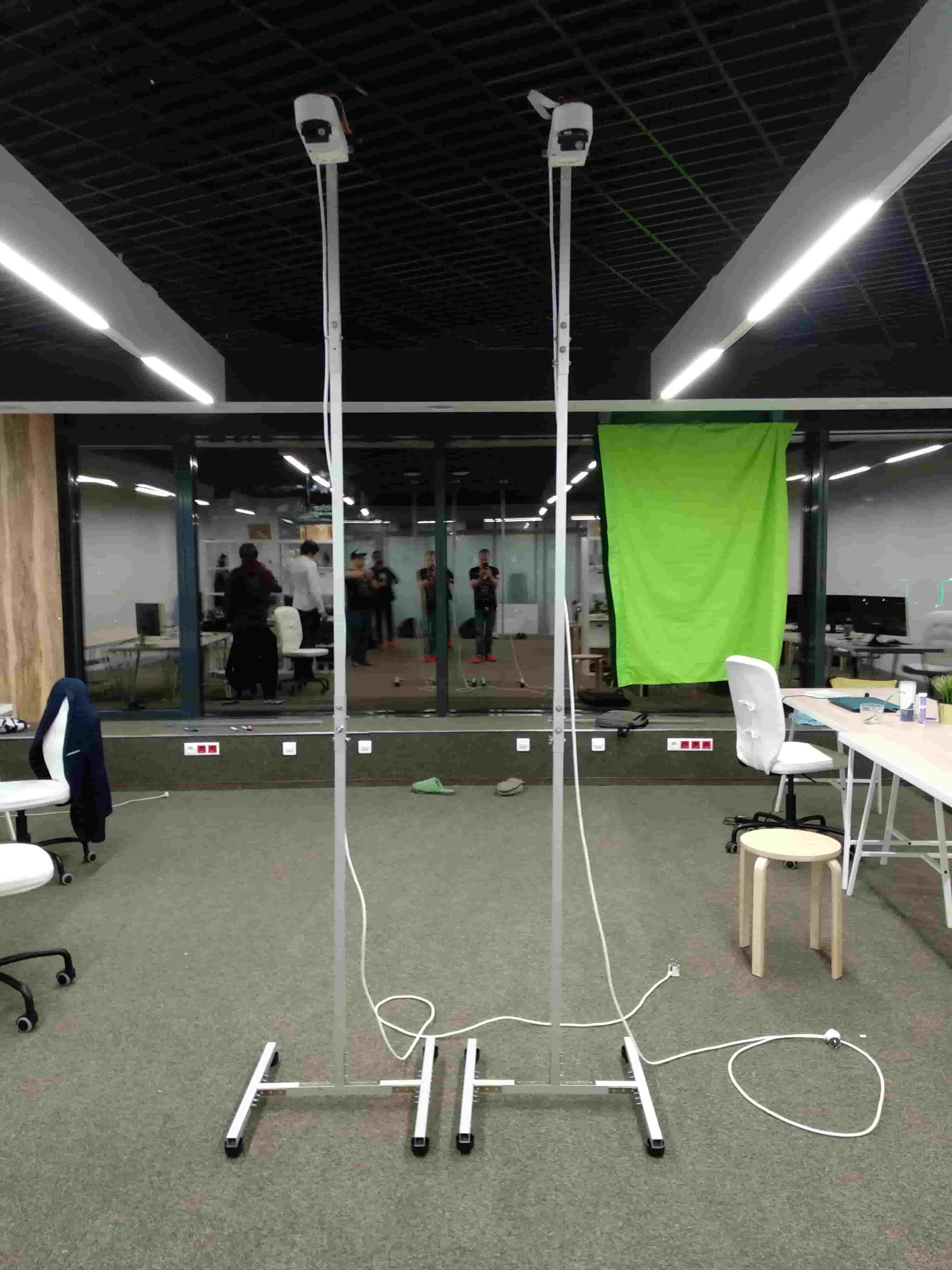 Two assembled camera stations mounted on test stands during indoor demonstration